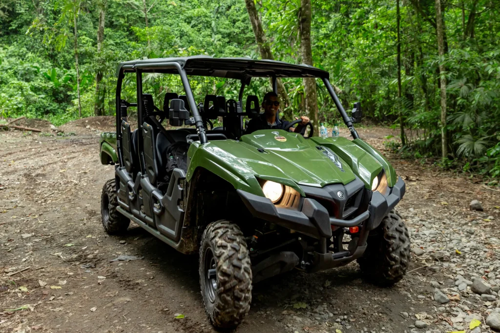 off-road side by side vehicle in rainforest trail la fortuna