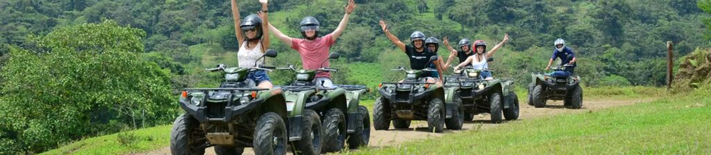 group of travelers riding ATVs during Outback tour in La Fortuna Costa Rica
