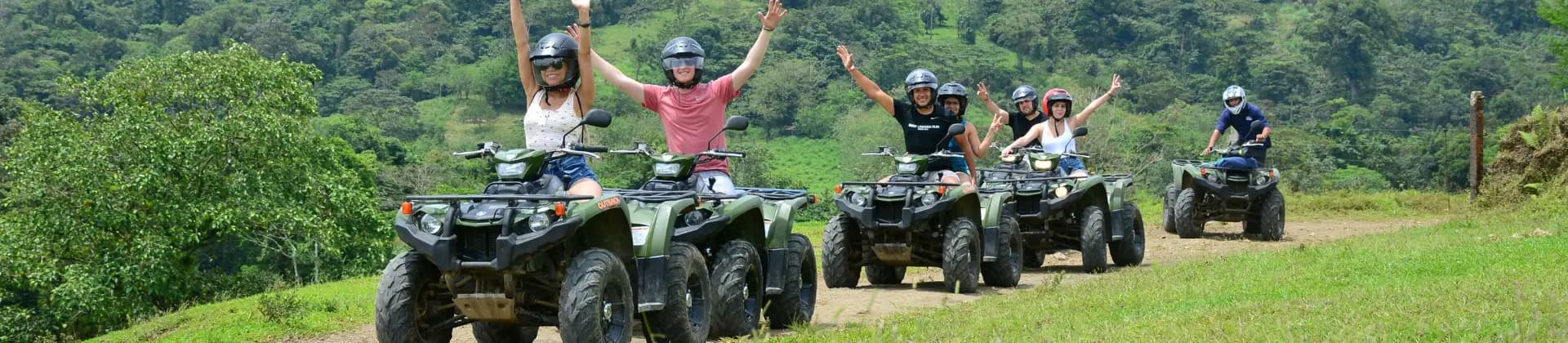 group of travelers riding ATVs during Outback tour in La Fortuna Costa Rica