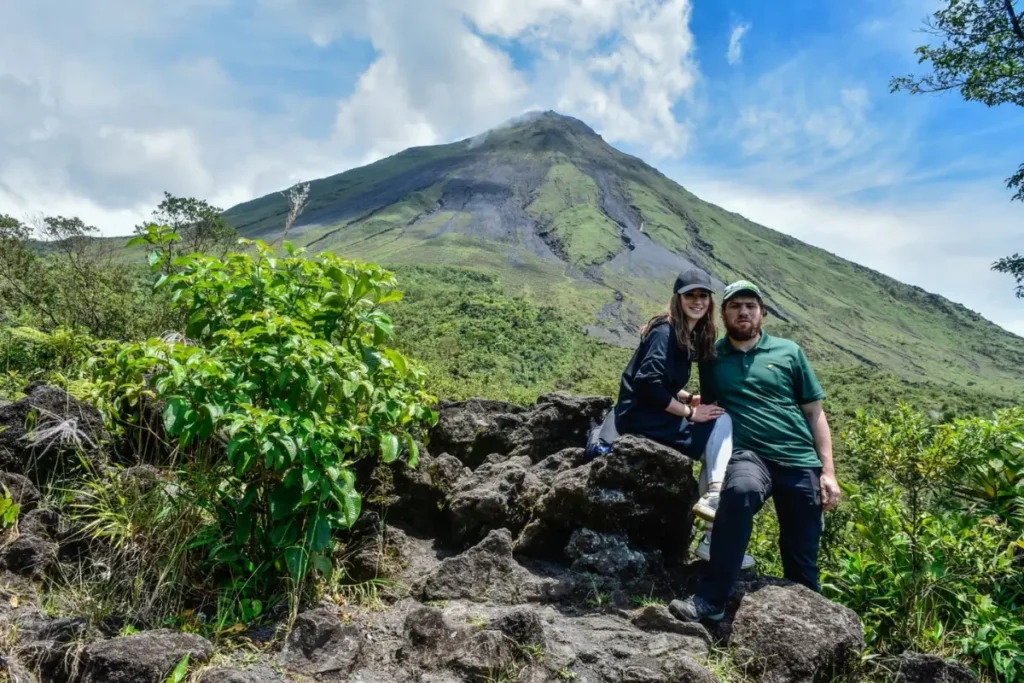 couple on Outback ATV tour exploring volcanic trails near Arenal Volcano