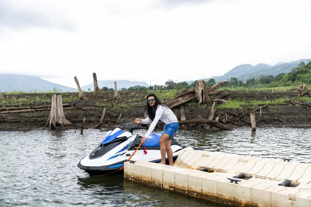 preparing to ride a jet ski on Lake Arenal in La Fortuna, Costa Rica.