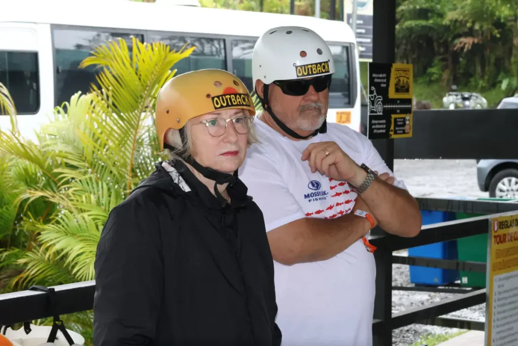 Travelers listening to ATV safety instructions before starting a tour in La Fortuna, Costa Rica.